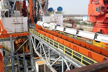 Gantry crane on a ship with drill pipe