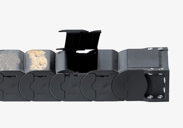 Energy chains for protection against dirt and swarf